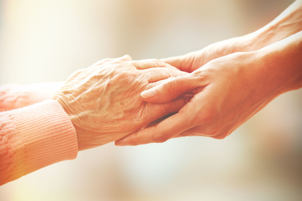 34932417 - helping hands, care for the elderly concept